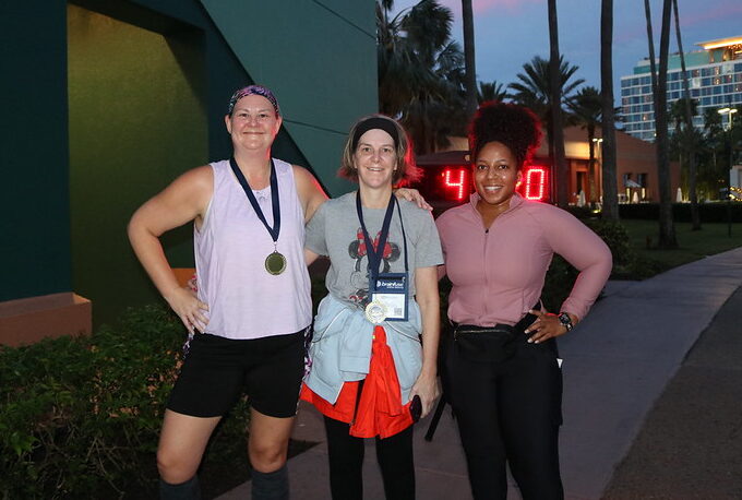 3 women smiling for a photo after running the 5K fun fun at OLC Accelerate 2024