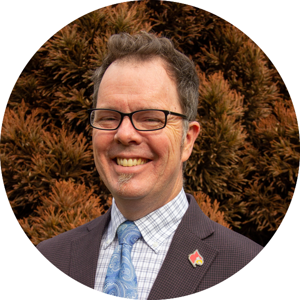 Professional headshot of Dr. Kelvin Thompson